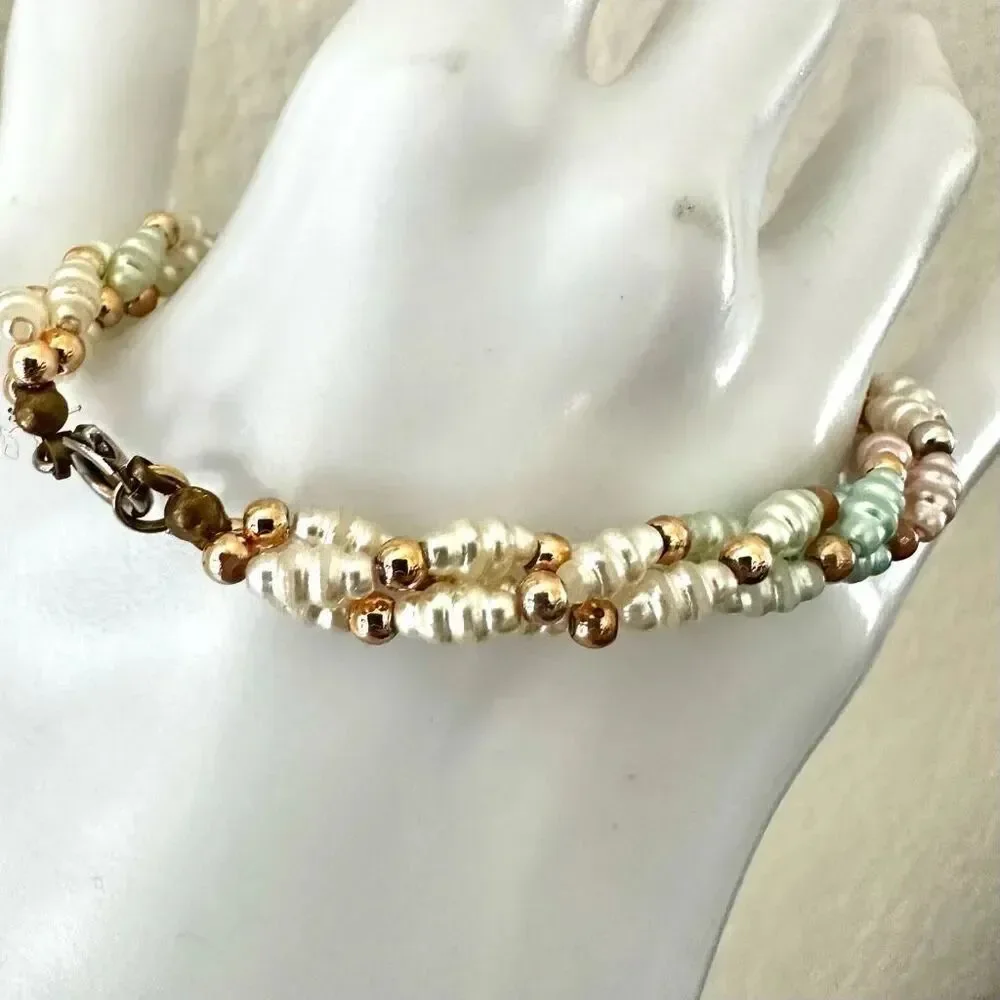 Faux pearl twisted multi strand bracelet